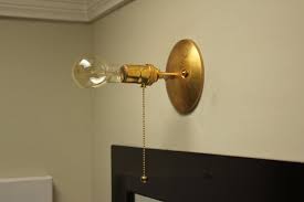 The best closet lighting will be provided by a fixture wired into an electrical circuit. Industrial Pull Chain Light Wall Sconce Raw Brass Mid Etsy Closet Lighting Plug In Wall Lamp Closet Light Fixtures