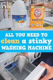 Why Your Washing Machine Smells And How To Clean It Stinky Washing Machine Washing Machine Smell Clean Washing Machine