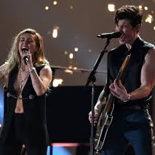 Shawn mendes endures literal and figurative storms in the new video for his anguished new single,in my blood. the track marks the first single off the singer's forthcoming third album. Miley Cyrus And Shawn Mendes Grammys Performance 2019 Video Popsugar Entertainment