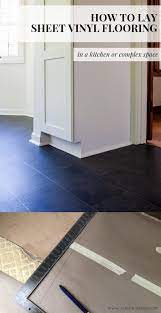 Vinyl flooring is durable and easy to lay. How To Lay Sheet Vinyl Flooring In A Complex Larger Space Our Diy Kitchen Reno Slate Look Vinyl Create Enjoy