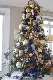 These chic and simple green christmas decorations give a nod to nature in the midst of winter's chill and celebrate the soothing shade in all of its subtlety — from moss to mint, pear to lime. Blue And Green Tartan Plaid Christmas Home Tour 2019 Style House Interiors Christmas Tree Decorating Themes Christmas Tree Inspiration Christmas Tree Themes