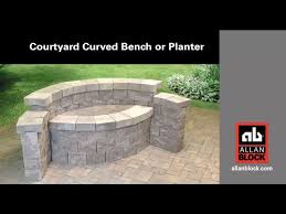Once the wall was built, he added more sandstone to match the bench. How To Build A Courtyard Curved Bench Or Planter Youtube