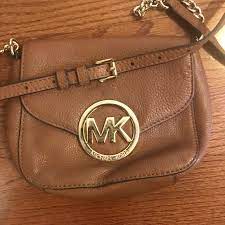 Michael korssignature slater medium sling pack messenger bag. Michael Michael Kors Bags Michael Michael Kors Brown Leather Crossbody Bag Poshmark