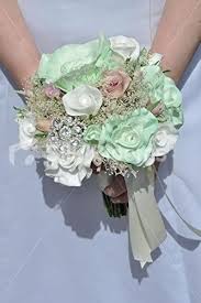 Plan to make one of your practice bouquets for the day you'll have your wedding gown fitting. Amazon Com Silk Blooms Ltd Vintage Mint Green Ivory Rose Bridesmaids Wedding Bouquet Kitchen Dining