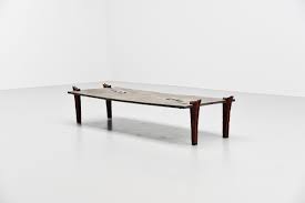 This coffee table is available with a durable tempered glass top. Jules Dewaele Pia Manu Coffee Table Belgium 1972 Massmoderndesign