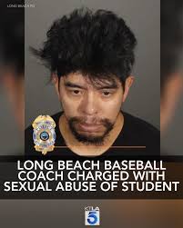 A Long Beach man who coaches high school baseball has been charged with  multiple sex crimes against a female student, and authorities are  continuing to search for potential victims.