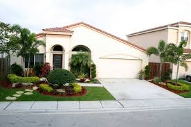 Tropical garden is very popular garden style in asia. Front Yard Tropical Garden Miami By Bamboo Landscaping And Services Inc Houzz Ie