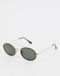 Choisissez parmi les tout nouveaux modèles de lunettes de soleil emblématiques, disponibles avec différents styles, montures et verres, y compris des lunettes de soleil polarisées et des éditions limitées. Rayban Lunettes De Soleil Fines Ovales Avec Barre Superieure Noir Et Dore Asos