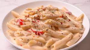 The becamel sauce pasta is made with a creamy and rich white sauce and mixed with cooked pasta. Creay White Sauce Pasta Restaurant Style