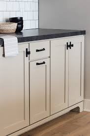 Those who go for a painted look often. Putty Colored Cabinets And Cabinet Painting Tips The Lilypad Cottage