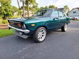 Image result for Apple Green 1958 Datsun