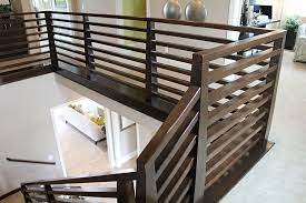 Today, an indoor banister rail is commonly known as a handrail to distinguish it from a horizontal bottom rail that might support spindles. Contemporary Railings Hci Railing Systems Interior Stair Railing Interior Stairs Wood Railing
