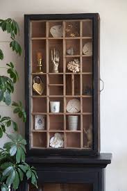 Because the doors open up and out of the way, one could potentially leave the door open when retrieving things from a cabinet or moving things back and forth. Glass Antique Wooden Sliding Wall Display Cabinet Rockett St George
