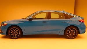 Honda's rollout of the latest generation civic compact car continues with the 2022 civic hatchback. The 2022 Honda Civic Hatchback Comes With A Stick Shift