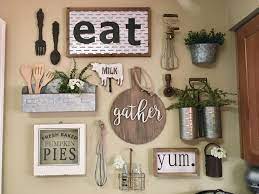 These fifty wooden wall décor finds add the rustic, not the usual, into your home. My Kitchen Gallery Wall Kitchendecor Gallerywall Farmhouse Decorating Walldecor Hobbylobby Kitchen Gallery Wall Dining Room Wall Decor Dining Room Walls