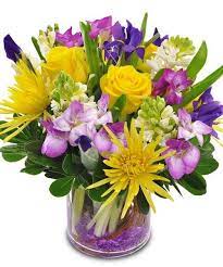 Featuring Bold Spring Colors And Beautiful Blooms That Perfectly Capture The Essence Of The Sea Garden Centerpiece Spring Floral Arrangements Beautiful Flowers