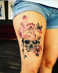 Trash Polka Flowers Covered Skull Tattoo On Thigh For Adventurous Women Thigh Tattoos Women Skull Thigh Tattoos Hip Tattoos Women