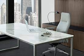 White marble reception room corner with desk. Credentials Freestanding Marble Desk Gunlocke Office Furniture Wood Casegoods Desking Seating Confere Office Table Design Office Furniture Design Marble Desk