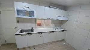 廚具介紹這套一字型廚具客戶位於楊梅整套長度約300公分廚具主體是白色珍珠板檯面搭配豪山牌三機色系搭配 home appliances kitchen cabinets stacked washer dryer