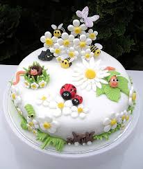 The boys wore next suits with emerald green ties to match the pretty bridesmaid dresses. Birthday Cakes The Inspiration For This Cute Garden Bug Cake Was The Sales Display In Debenhams For Marc Jacobs Daisy Perfume Yesbirthday Home Of Birthday Wishes Inspiration