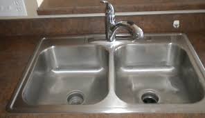 should you caulk a kitchen sink