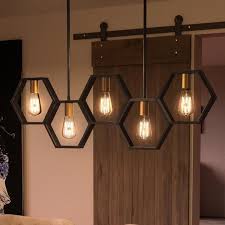 The pharos pendant, calla pendant and oculo pendant work best as a trio in this stylish set by jeremy pyles. Urban Ambiance Our Industrial Chandelier From The Venezia Collection Offers Adjustable Hanging Heights And Is Compatible With Dimmable Bulbs The Geometrical Honeycomb Pattern And Natural Black Finish Make It The Perfect