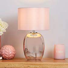 This adorable lampshadewill fit most standard lamp bases (base not included). Seychelles Mini Blush Pink Table Lamp Dunelm