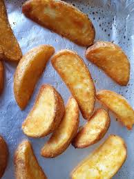 Seasoned Baked Potato Wedges Recipe Potato Wedges Baked Recipes Golden Potato Recipes
