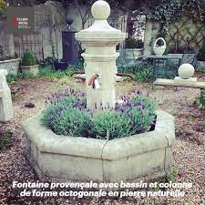 fontaine provencale avec bassin et colonne de forme octogonale en pierre par l atelier alain bidal fontaine pierre pierre pierre naturelle
