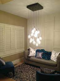 Bad Proportion The Chandelier Is Too Low And People May Hit It And Hurt Their Eyes Foyer Pendant Lighting Industrial Chandelier Modern Glass