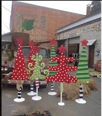 First, you need a christmas tree stand in which to sit your tree so it remains in place. Whimsical Tree Farm From The Mailman S Daughter Boston Ga Aliceandjay Com Christmas Yard Decorations Christmas Crafty Christmas Wood