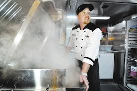 Best dining in las vegas, nevada: Executive Chef Malcolm Clark Is Shown Preparing Fish Tacos In The Kitchen Of The Don Schumacher Racing Hospitality Trailer At The Las Vegas Motor Speedway At 7000 Las Vegas Blvd North In