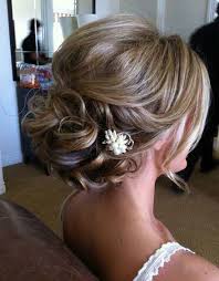Rejuvenate the classic chignon by twisting back smaller sections and securing with a large flower for the maximum impact. Shoulder Length Hair Wedding Hairstyles For Short Hair Updos Addicfashion
