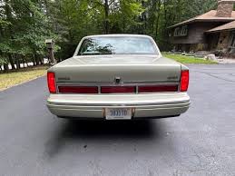 Image result for Light Cypress 1997 Town Car