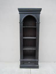 If you're putting a bookshelf in a small nook or corner of the room, try getting a corner bookshelf, scaffold or ladder design. Tall Narrow Bookcase Nadeau Alexandria