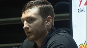 Rogers grad Daniel Garrett takes over at program's head football coach