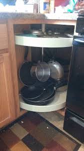 Adjust Your Lazy Susan For Pot Rack In Corner Cabinet And Hang Hooks From Underside Of Shelf Kitchen Organization Kitchen Sink Decor Lazy Susan