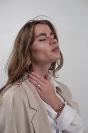 Hand touching unemotional black woman in traditional neck rings · Free  Stock Photo