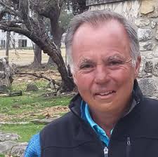 How long to smoke bone-in pork chops at what temperature?