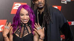 That's how they are related. Interview With Wwe Cousins Sasha Banks Snoop Dogg At 2k Event Miami Herald