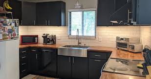 Black kitchen cabinets are a stylish alternative that looks way much more glam than plain white. Blue To Black Kitchen Cabinets Projects By Heather At Menards