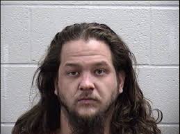 Two face charges in connection with motel shooting