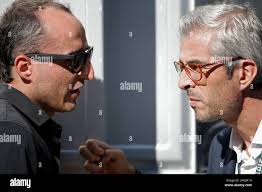 (L to R): Alessandro Alunni Bravi (ITA) Driver Manager with Robert Kubica  (POL) Williams Reserve and Development Driver. 09.06.2018. Formula 1 World  Championship, Rd 7, Canadian Grand Prix, Montreal, Canada, Qualifying Day.  Photo credit should ...