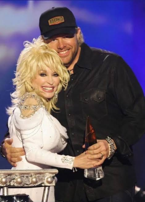 Toby loved and respected Dolly. He was thrilled and honored to be asked to  perform on Dolly's Special, 50 Years At The Grand Ole Opry. He sang  Kentucky Gambler one of his
