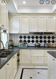 Tile manufacturers are keeping up with the times and following the trends of a great thing about choosing white tiles is you have so many options for counters, cabinets, and decor. Pin By The Jewel Princess On Black And White Kitchen White Kitchen Tiles White Kitchen Floor White Tile Kitchen Floor