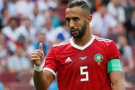 تطور أداء كابتن المنتخب المغربي بن عطية البالغ من العمر 31 عاما بحيث أصبح واحدا من أفضل المدافعين في أوروبا في السنوات الأخيرة، ولعب في صفوف أكبر وأعرق النوادي في القارة العجوز. Ù„ÙŠØ³ Ù„Ø¯ÙŠÙ†Ø§ Ù…Ø­Ø±Ø² Ø¨Ù†Ø¹Ø·ÙŠØ© ÙŠØ´Ø®Øµ Ø¹Ù‚Ù… Ø§Ù„Ù…Ù†ØªØ®Ø¨ Ø§Ù„Ù…ØºØ±Ø¨ÙŠ ÙÙŠ Ø§Ù„Ø¨Ø·ÙˆÙ„Ø§Øª Ø§Ù„Ø¹Ø§Ù„Ù… Ø§Ù„Ø¬Ø²ÙŠØ±Ø© Ù†Øª