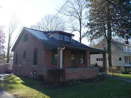 Get free shipping on qualified metal roofing or buy online pick up in store today in the building materials department. Replacement Windows Marvin Infinity Windows Standing Seam Metal Roof On Colonial Home In Media Pa Dark Brown Standing Seam Metal Roof Over Brick Home In Media Pa