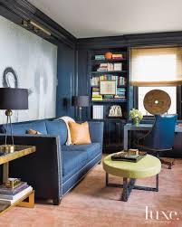 Furnishing in pale neutral tones and dark woods add both contrast and visual interest while enhancing the room's modern vibe. Traditional Blue Study Furniture Design Living Room Black Dining Room Interior