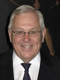 Newcombe takes the chair