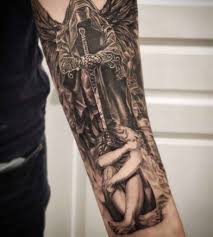 This tattoo covers a larger area and can be placed on the arm or the legs. 25 Angel Tattoo Designs For Men Of Faith